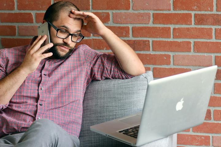 a man with a laptop