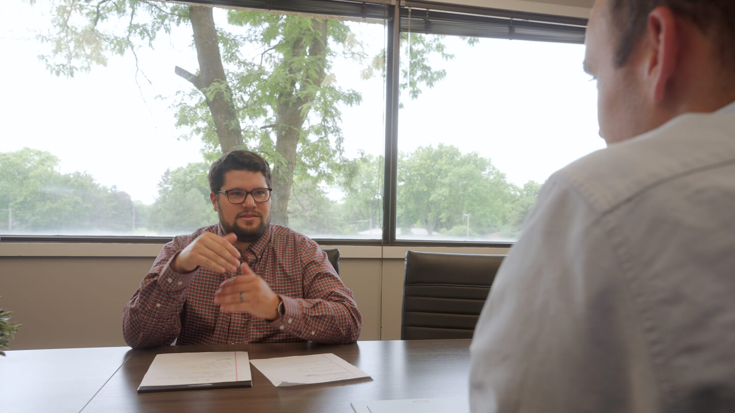 netsuite implementaion consultant talking to a customer