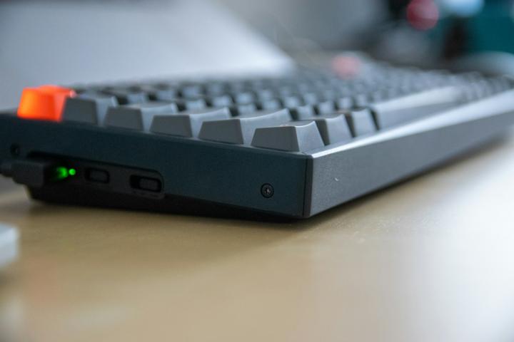 black computer keyboard on brown wooden table