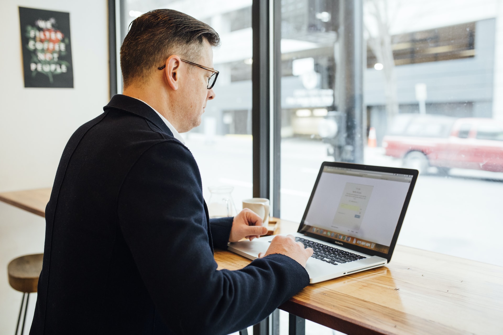 salesman on computer using netsuite