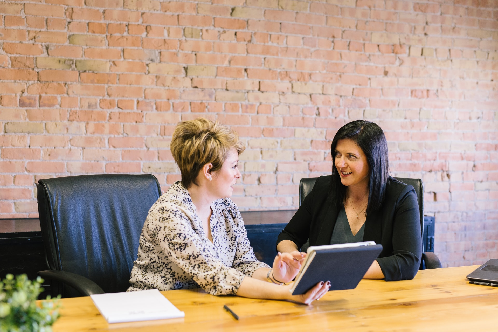 two woman working on hr management