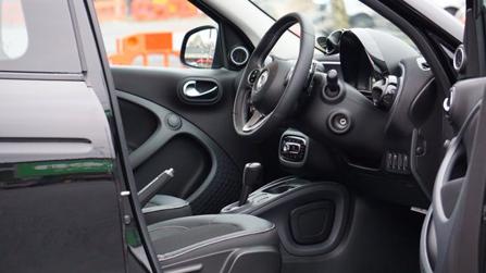 internal view of a car through an open door