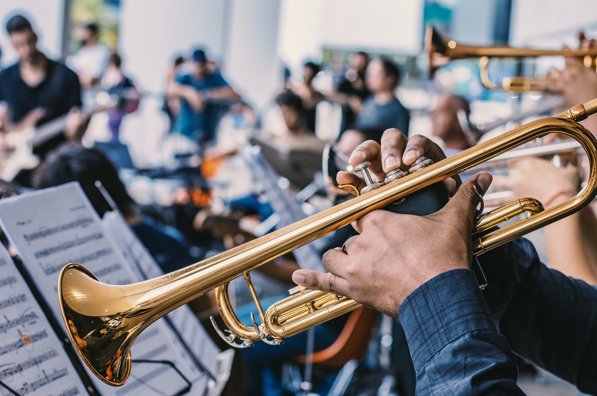 playing gold trumpet