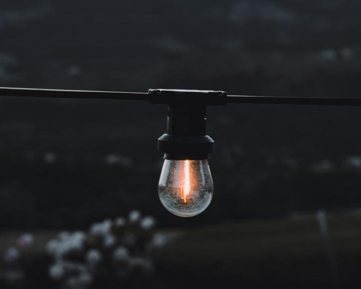 black and clear light bulb