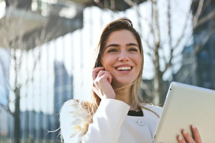 woman talking in phone and smiling