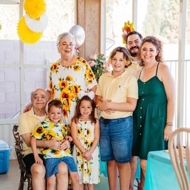 Caregiver with her family at a birthday party