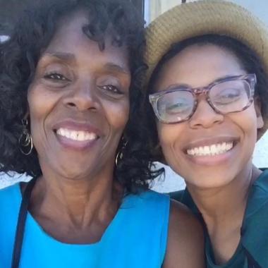 Caregiver taking a smiling selfie with her mom