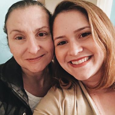 Caregiver taking a selfie with her mother