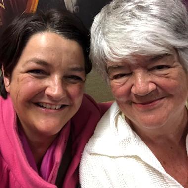 caregiver smiling with her mother